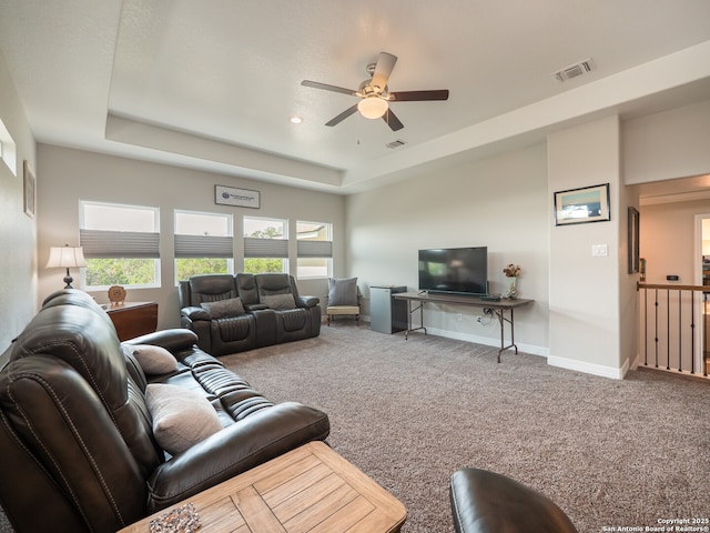 1006 Rock Shelter, San Antonio, TX 78260 - living area featuring carpet floors, a ceiling fan, a tray ceiling, and baseboards