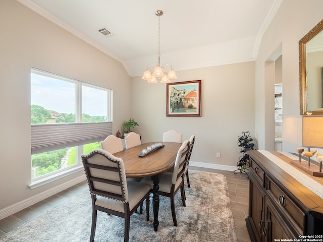 1006 Rock Shelter, San Antonio, TX 78260 - dining room featuring ornamental molding, a chandelier, baseboards, vaulted ceiling, and wood finished floors