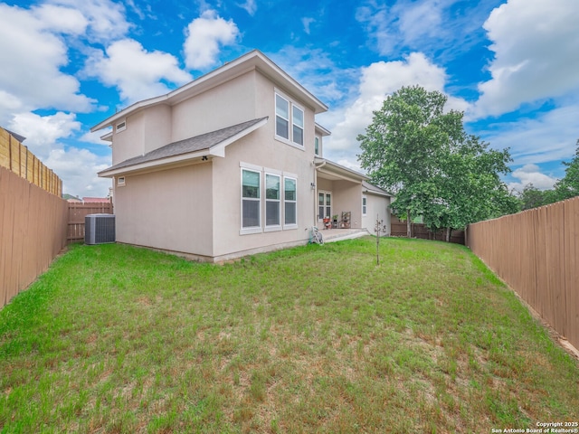1006 Rock Shelter, San Antonio, TX 78260 - back of property featuring stucco siding, central air condition unit, and a patio area