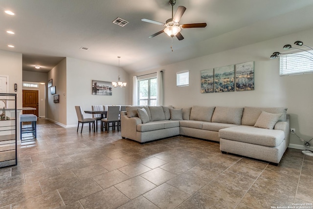 10250 Bricewood Pl, San Antonio, TX 78254 - living room with baseboards, ceiling fan, recessed lighting, a chandelier, and stone finish flooring