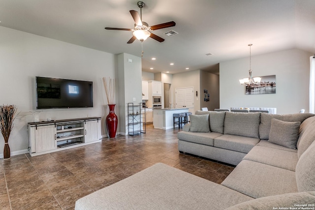 10250 Bricewood Pl, San Antonio, TX 78254 - living area featuring a chandelier, a ceiling fan, baseboards, dark stone finish floors, and recessed lighting