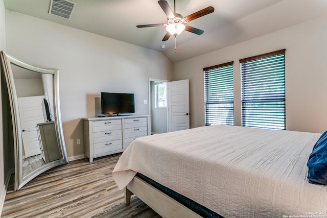 10250 Bricewood Pl, San Antonio, TX 78254 - bedroom featuring light wood-type flooring, vaulted ceiling, baseboards, and ceiling fan