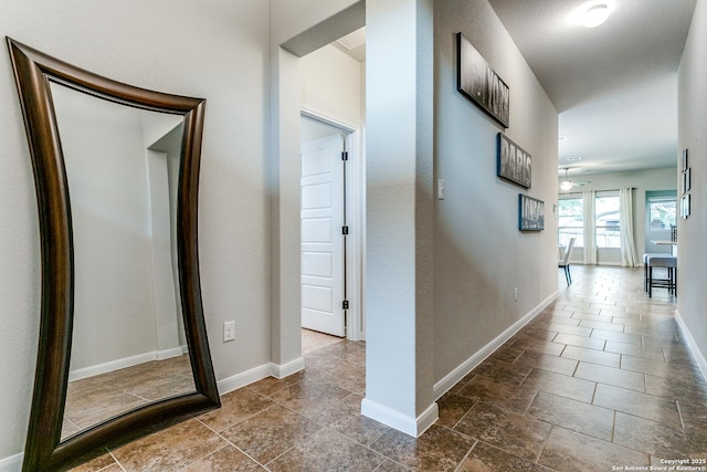 10250 Bricewood Pl, San Antonio, TX 78254 - hallway featuring baseboards