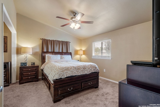 11301 Ford, Adkins, TX 78101 - bedroom featuring lofted ceiling, light colored carpet, baseboards, and ceiling fan