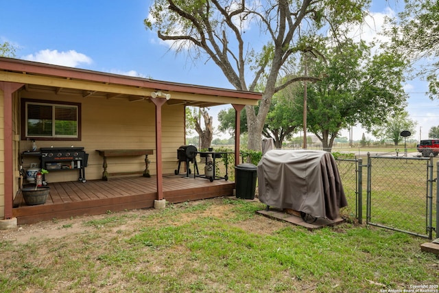 11301 Ford, Adkins, TX 78101 - view of yard with a gate and a wooden deck