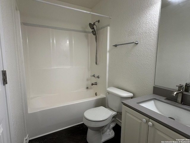 185 Quail Valley Dr, Bandera, TX 78003 - full bathroom with a textured wall, toilet, vanity, and shower / bath combination