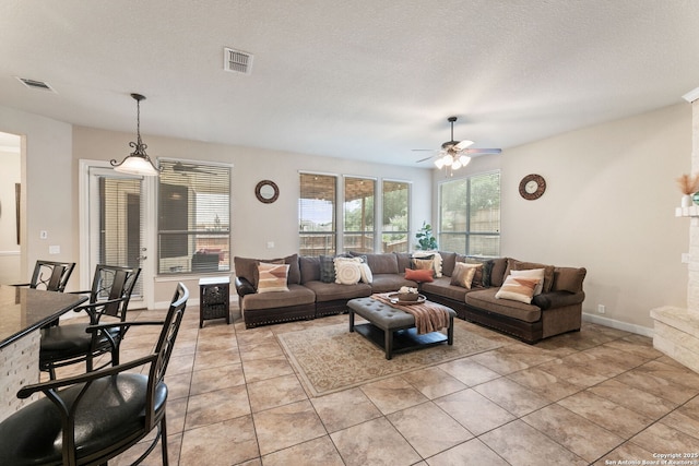 12234 Prince Solms, San Antonio, TX 78253 - living room with a ceiling fan and light tile patterned flooring