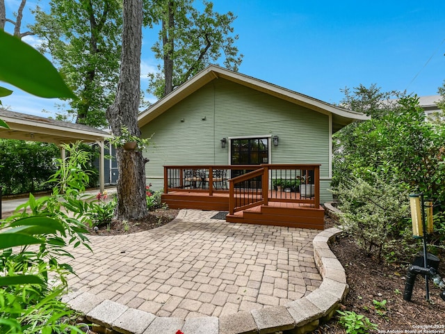 207 Queen Anne, San Antonio, TX 78209 - back of house with a deck and a patio