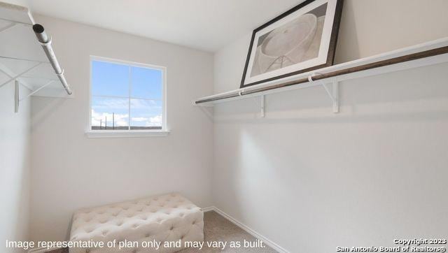 7222 Salado Creek Pkwy, San Antonio, TX 78222 - walk in closet featuring carpet