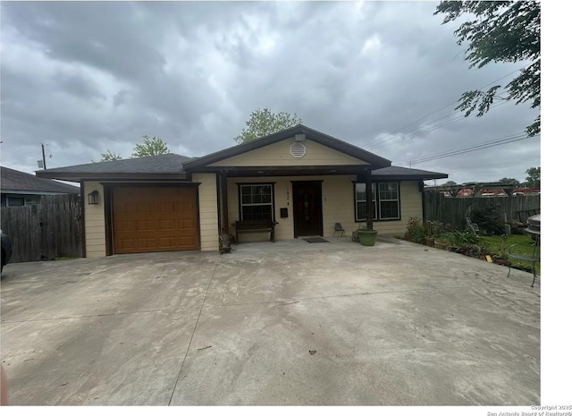 1924 Owens Ave, Groves, TX 77619 - view of front of property featuring a garage and concrete driveway