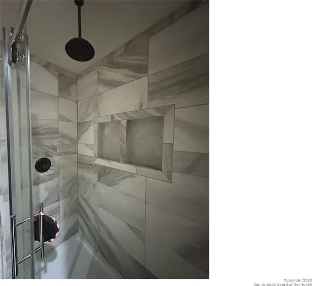 1924 Owens Ave, Groves, TX 77619 - full bathroom with a tile shower