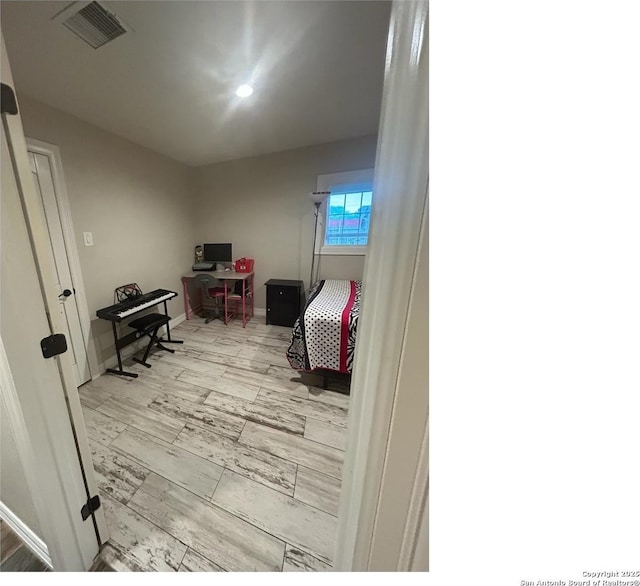 1924 Owens Ave, Groves, TX 77619 - bedroom featuring a desk, baseboards, and recessed lighting