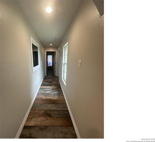 1924 Owens Ave, Groves, TX 77619 - corridor featuring baseboards, dark wood-style floors, and recessed lighting