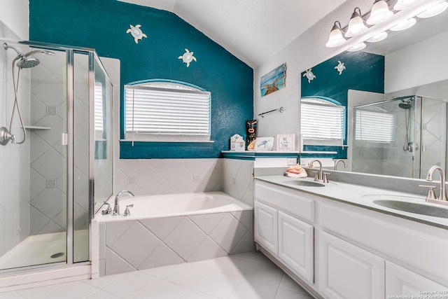 1002 Alpine Pond, San Antonio, TX 78260 - bathroom featuring lofted ceiling, a shower stall, tile patterned flooring, a garden tub, and double vanity