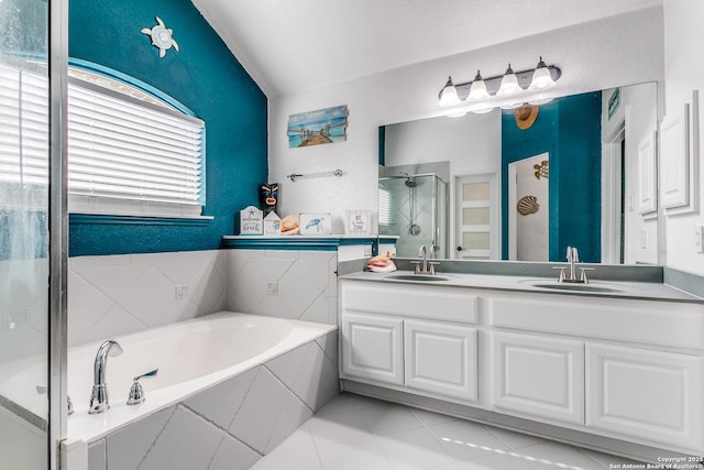 1002 Alpine Pond, San Antonio, TX 78260 - full bath with vaulted ceiling, a shower stall, tile patterned floors, a garden tub, and double vanity