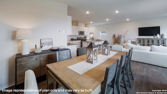 9807 Beaumont Brk, San Antonio, TX 78221 - dining space featuring dark wood finished floors and recessed lighting