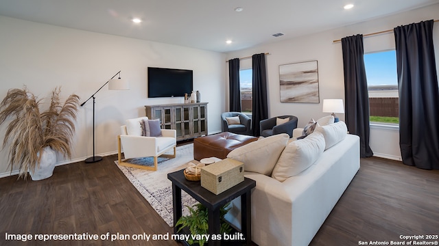 711 Garnier Pass, San Antonio, TX 78221 - living room with dark wood-style flooring, baseboards, and recessed lighting
