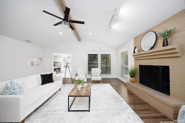 14613 Hook Dr, San Antonio, TX 78231 - living room with wood finished floors, a ceiling fan, a brick fireplace, recessed lighting, and baseboards