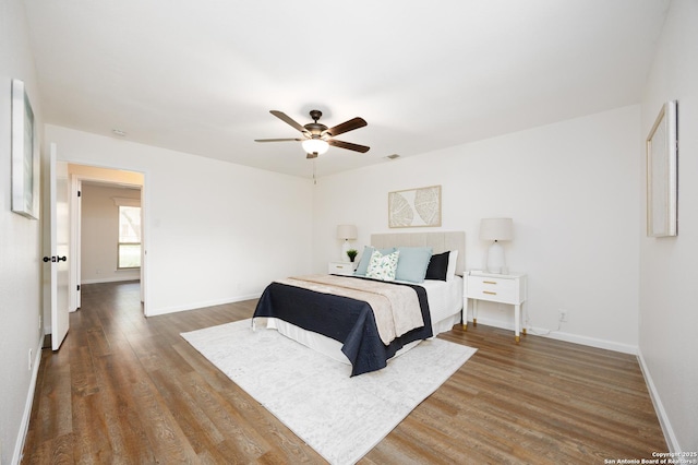 14613 Hook Dr, San Antonio, TX 78231 - bedroom with wood finished floors, baseboards, and ceiling fan