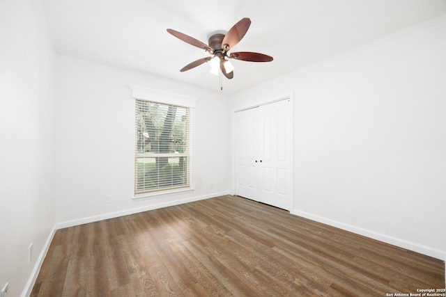 14613 Hook Dr, San Antonio, TX 78231 - unfurnished room with wood finished floors, baseboards, and a ceiling fan