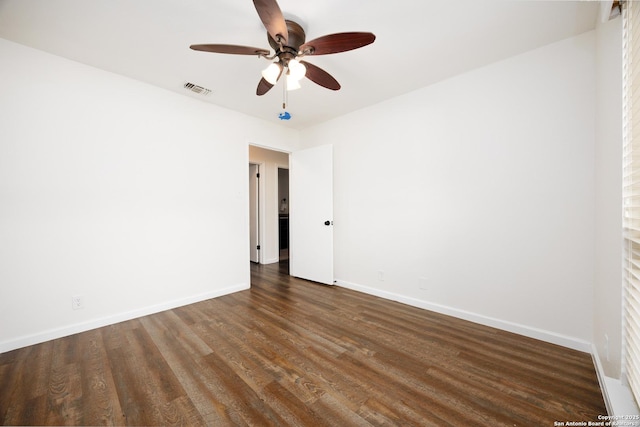 14613 Hook Dr, San Antonio, TX 78231 - empty room featuring ceiling fan, baseboards, and dark wood-type flooring