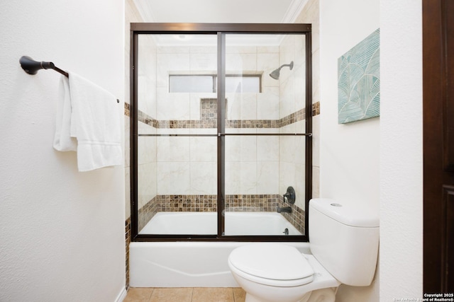 14613 Hook Dr, San Antonio, TX 78231 - full bathroom with toilet, bath / shower combo with glass door, and tile patterned flooring