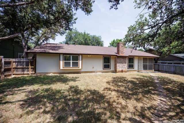 14613 Hook Dr, San Antonio, TX 78231 - back of property featuring a chimney and a sunroom