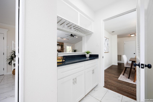 14613 Hook Dr, San Antonio, TX 78231 - bar area with light marble finish floors, baseboards, and a ceiling fan