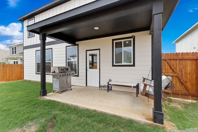 809 Altapass Hls, Seguin, TX 78155 - rear view of property with board and batten siding and a patio