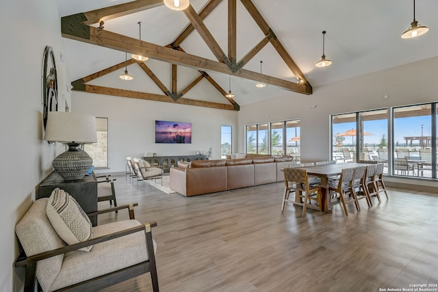 13722 Birch Xing, San Antonio, TX 78252 - living room featuring high vaulted ceiling, beam ceiling, and wood finished floors