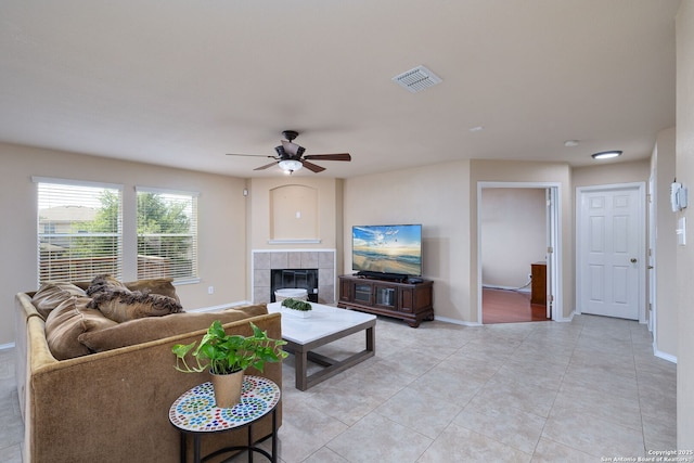 11106 Shetland Hls, San Antonio, TX 78254 - living room with ceiling fan, baseboards, light tile patterned floors, and a fireplace