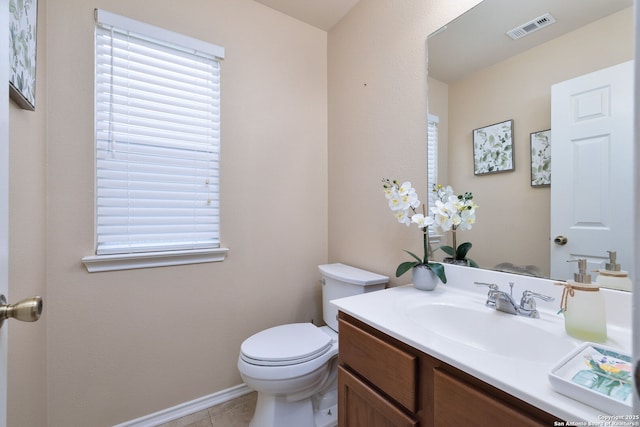 11106 Shetland Hls, San Antonio, TX 78254 - bathroom with toilet, vanity, tile patterned floors, and baseboards