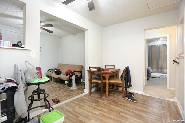 311 W Malone Ave, San Antonio, TX 78214 - dining area featuring a ceiling fan, a textured ceiling, light wood-style flooring, and baseboards