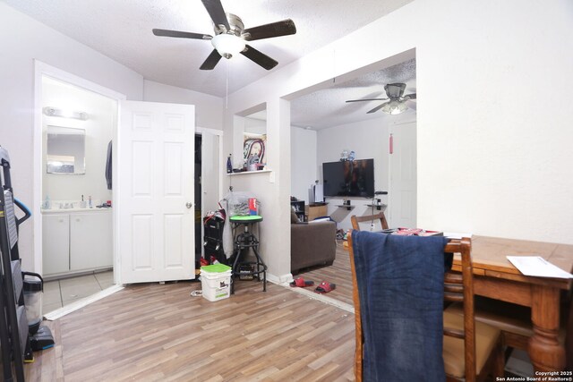 311 W Malone Ave, San Antonio, TX 78214 - dining area with ceiling fan, light wood-type flooring, and a textured ceiling