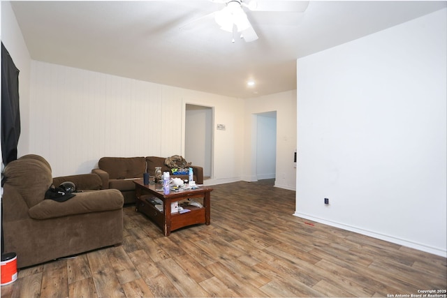 311 W Malone Ave, San Antonio, TX 78214 - living room with a ceiling fan, wood finished floors, and baseboards