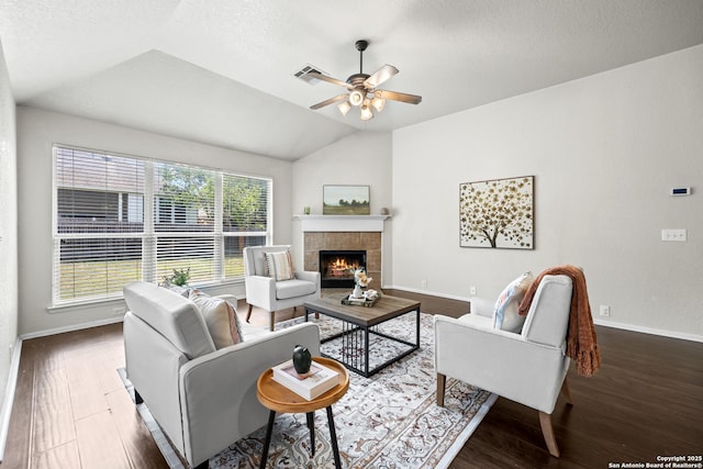 26430 Walden Oak, San Antonio, TX 78260 - living room with wood finished floors, baseboards, ceiling fan, lofted ceiling, and a tiled fireplace