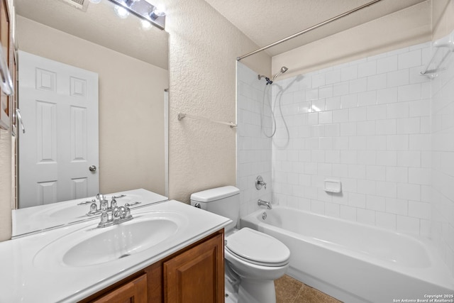 26430 Walden Oak, San Antonio, TX 78260 - full bathroom with a textured wall, toilet, vanity, tile patterned flooring, and shower / tub combination