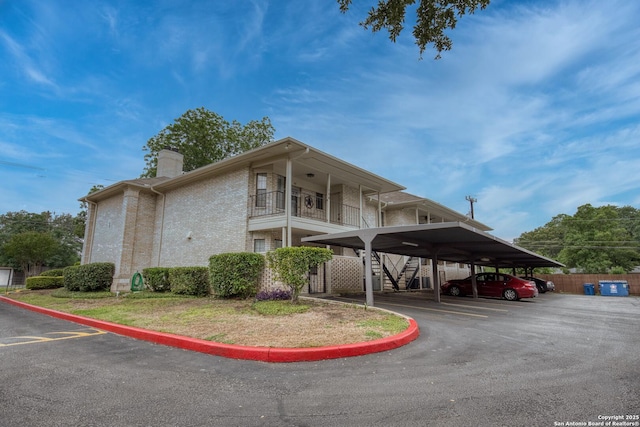 2611 Eisenhauer Unit 104A, San Antonio, TX 78209 - view of property with covered parking