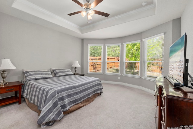 7635 Paraiso Crst, Boerne, TX 78015 - bedroom featuring a raised ceiling, crown molding, light carpet, baseboards, and a ceiling fan