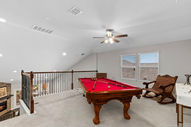 7635 Paraiso Crst, Boerne, TX 78015 - playroom with ceiling fan, carpet floors, a fireplace, billiards table, and lofted ceiling