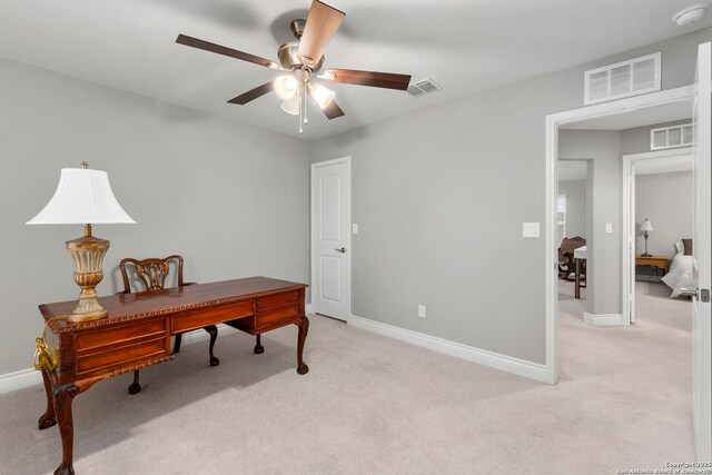 7635 Paraiso Crst, Boerne, TX 78015 - home office featuring light colored carpet, ceiling fan, and baseboards
