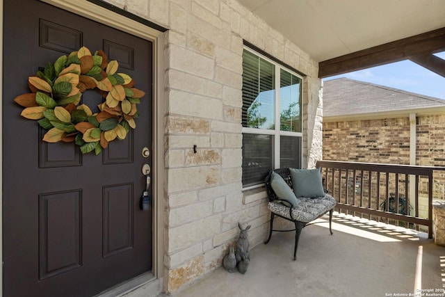 7635 Paraiso Crst, Boerne, TX 78015 - property entrance featuring a porch and stone siding