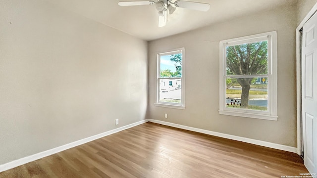 103 Pollydale Ave, San Antonio, TX 78223 - spare room featuring a ceiling fan, wood finished floors, and baseboards