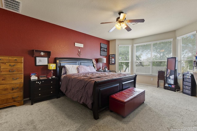 738 Daisy Xing, San Antonio, TX 78245 - bedroom with carpet, a ceiling fan, and baseboards