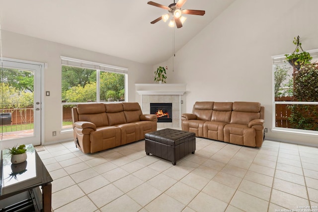 26223 Cuyahoga Cir, San Antonio, TX 78260 - living area with light tile patterned floors, a fireplace, a ceiling fan, and high vaulted ceiling