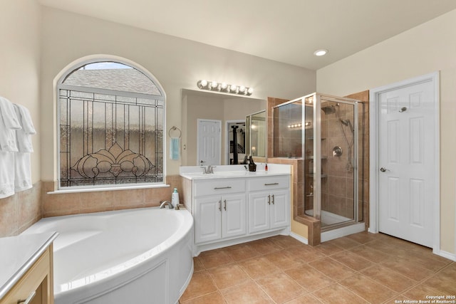 26223 Cuyahoga Cir, San Antonio, TX 78260 - full bathroom with a stall shower, vanity, tile patterned floors, and a garden tub