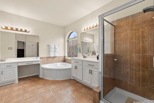 26223 Cuyahoga Cir, San Antonio, TX 78260 - bathroom with a stall shower, tile patterned flooring, a garden tub, and two vanities