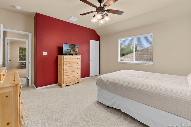 26223 Cuyahoga Cir, San Antonio, TX 78260 - bedroom featuring light carpet, multiple windows, vaulted ceiling, a ceiling fan, and baseboards