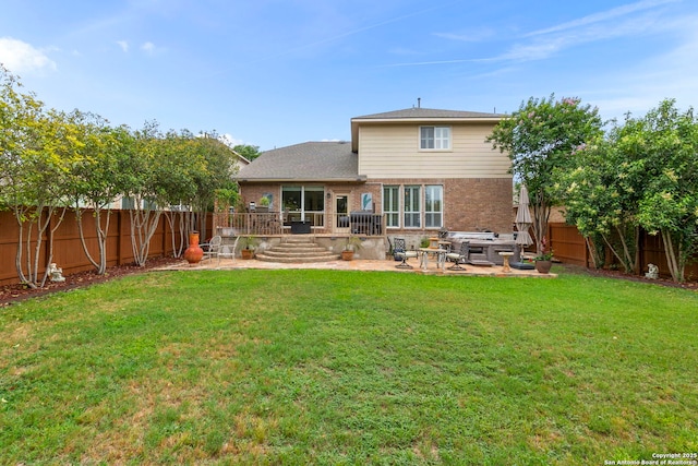 26223 Cuyahoga Cir, San Antonio, TX 78260 - back of house featuring a patio area and brick siding