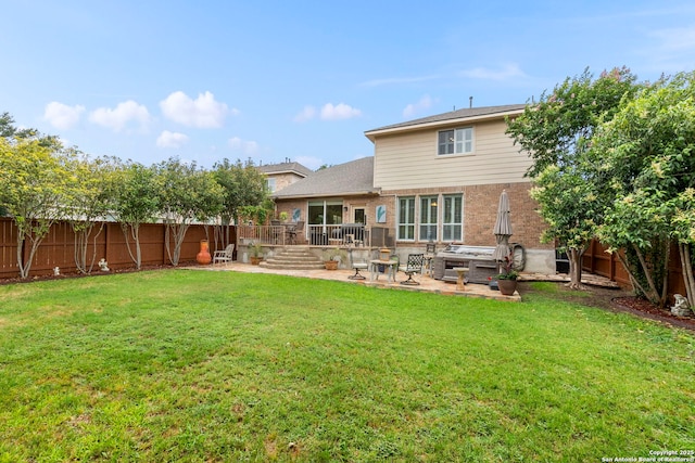 26223 Cuyahoga Cir, San Antonio, TX 78260 - back of property featuring a patio and brick siding